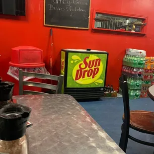 a soda machine in the background