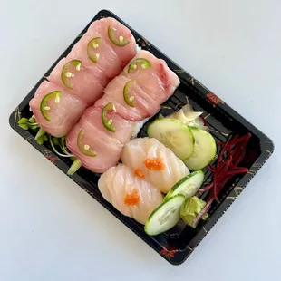 Buddhilicious Roll (hamachi, jalapeno, spicy albacore, avocado, cucumber, scallion radish sprouts) and Hotate (scallop) nigiri