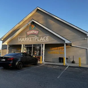a car parked in front of the store
