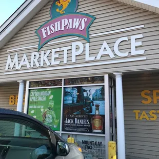 a car parked in front of the store
