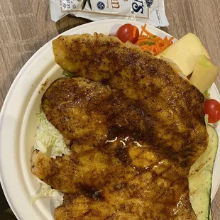 Grilled Swai with Cajun seasoning and a side salad and grilled zucchini