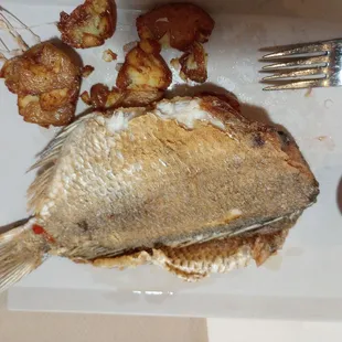 Fried porgy and potatoes w/house mumbo