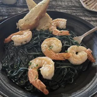 Shrimp Alfredo pasta with dyed black for the Harry Potter event
