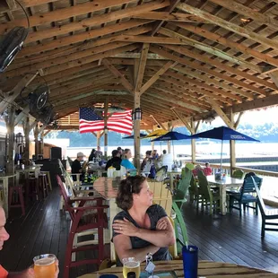 a group of people sitting at tables