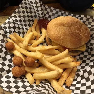 Cheeseburger, regular fries. The hush puppies you see are from my meal, and don't coMe with the burger.
