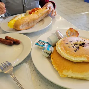 Short stack pancakes (3): $5, toppings are extra  Sausage (comes with 4, but i already had 2): $3.50  Coffee: $2.50 vs $4 across the street