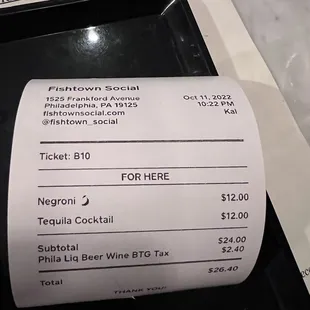 a receipt on a tray