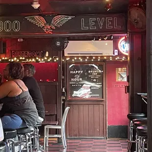 people sitting at the bar