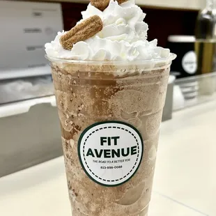 a cup of coffee with whipped cream