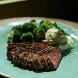 steak, broccoli and mashed potatoes