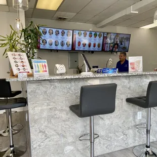 Inside: Front counter and TVs with menu