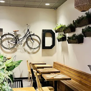 a bicycle hanging on the wall