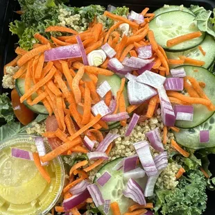 Kale and quinoa salad with lemon zest vinaigrette dressing.