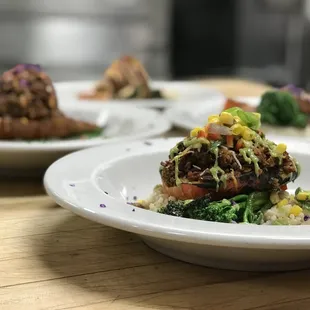 three plates of food on a table