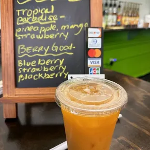 Get up juice made with strawberries, orange, ginger, and carrot