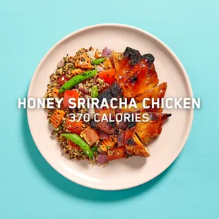 a plate of chicken and vegetables