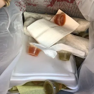 This is how the food comes when it's given to me. Box is smushed, salsa everywhere, and the products so hot I've burnt myself.