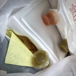 Crushed box and salsa everywhere.