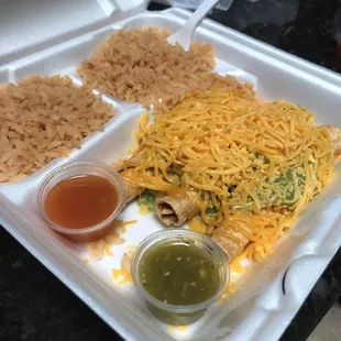 Taquitos (on the menu, rolled tacos) and all rice..