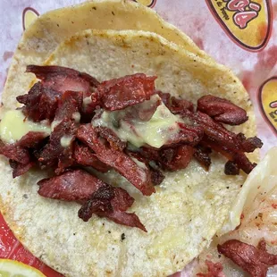 Taco looks sad and dry.  No taste