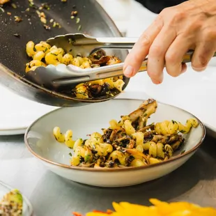 a plate of food being prepared