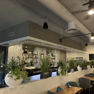 a restaurant with tables and chairs