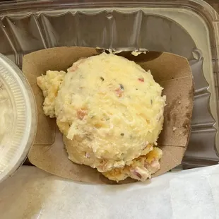 Potato was just like a mash potato and a twice baked loaded potato had a baby and this cheesy baby came out which was awesome.