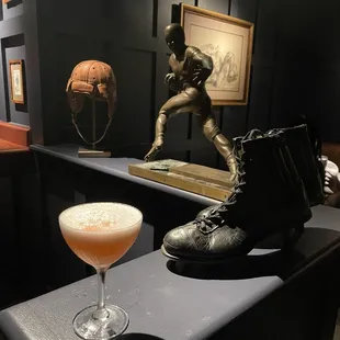 a statue of a baseball player and a cocktail