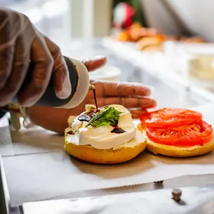 a person making a sandwich