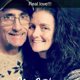 a man and woman posing for a picture