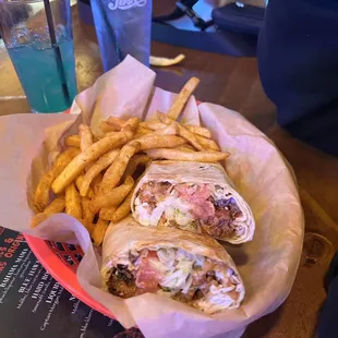 a basket of fries and a burrito