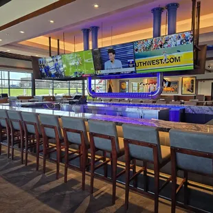 Large bar with oversized chairs for added comfort