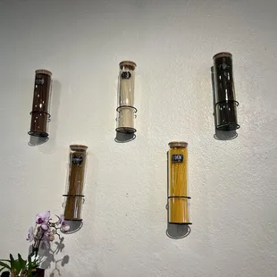 The five grain noodles displayed on the restaurant wall: sorghum, rice, pea, buckwheat, and corn.