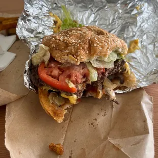 Cheeseburger with onions, tomato, lettuce, mushrooms, ketchup n mayo!!!