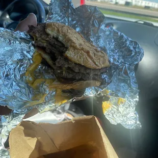 a sandwich wrapped in tin foil