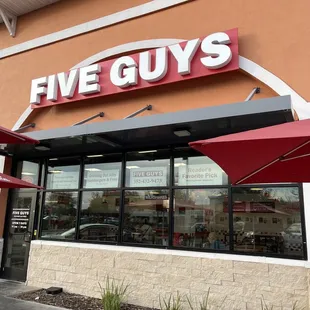 the front of a five guys restaurant