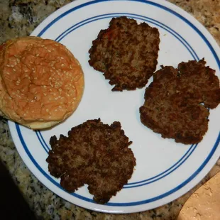 These patties are from a single burger and a double burger, not particularly thick, and (note the size of the bun).