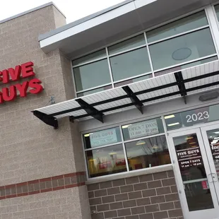 the front of a five guys store