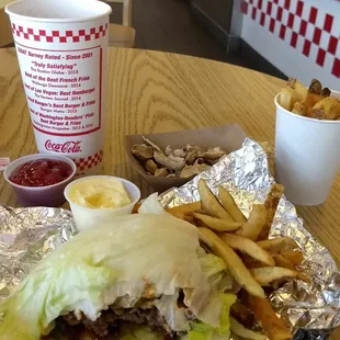 Small lettuce wrapped bacon burger with BBQ sauce and jalapenos, small fries, iced tea and free peanuts.