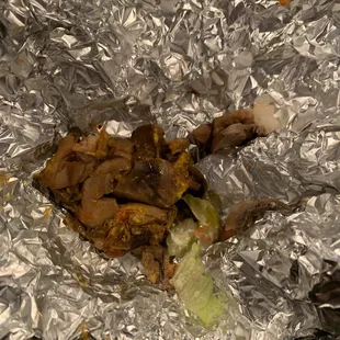 a sandwich wrapped in tin foil