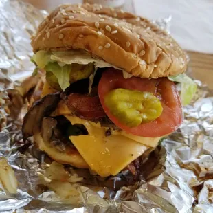 Bacon cheeseburger with all the way toppings.