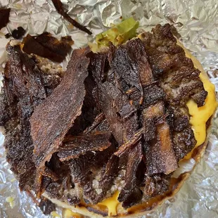 Ordered 2 bacon cheeseburgers and this is the bacon you&apos;ll receive at this place... disgusting