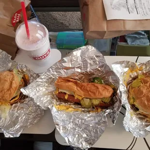 Cheeseburger. Cheese dog. Veggie cheese sando. Strawberry milkshake.