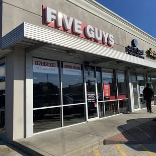 the front of a five guys store