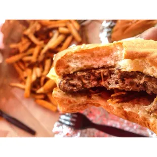 Little bacon cheeseburger with small Cajun fries. The small fries are enough for two people.