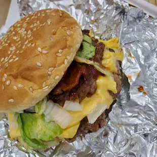 Double Cheeseburger (Onions, jalapenos, bacon, American cheese, mushrooms.