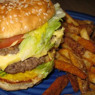 Regular burger (2 patties!) with lettuce, tomato, pickles, jalapenos and mustard alongside cajun fries ~ take out!