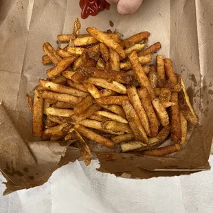 a box of french fries and ketchup
