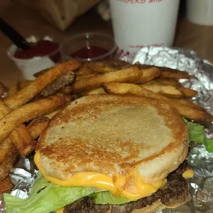 Custom:  Grilled Cheese Sandwich added a patty, lettuce, onions, and green peppers. &amp;  Little Cajun Fries