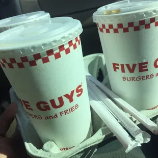 two cups of fast food on a tray